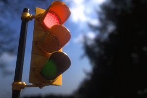 Who May Be Liable for a Red-Light Crash?